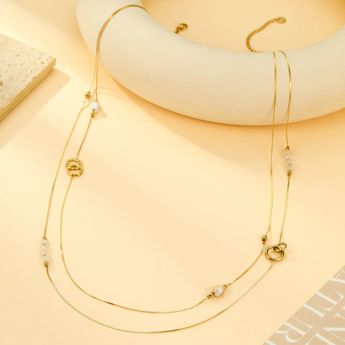 Sautoir fin perles blanches